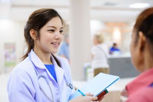 Veterinarian talking with client